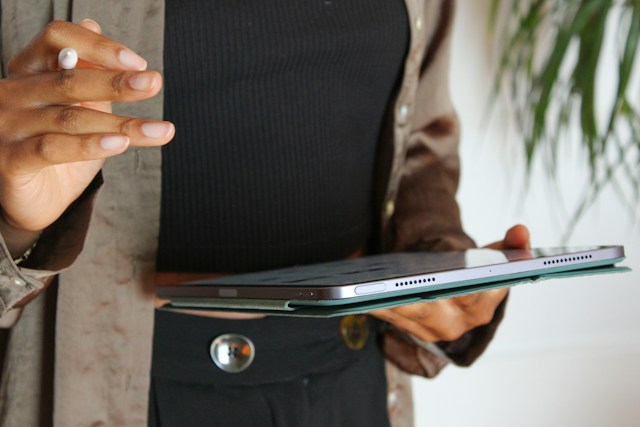 Consultant holding a tablet